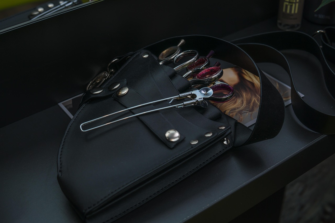 A roll of shears on a folded leather case